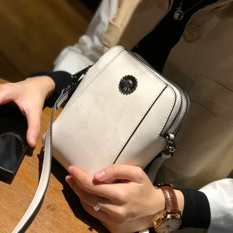 Ivory Leather Floral Medallion Crossbody Bag